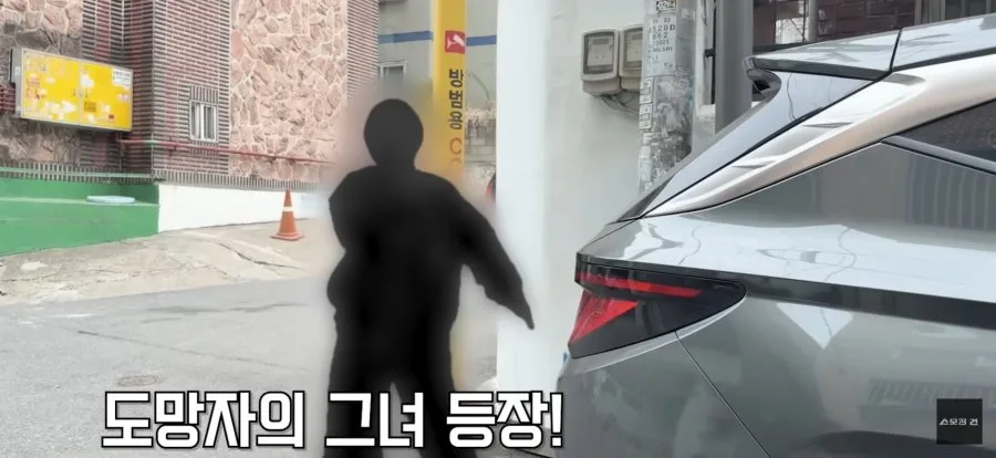 체포되면서 내연녀와 눈물로 이별하는 지명수배범.JPG